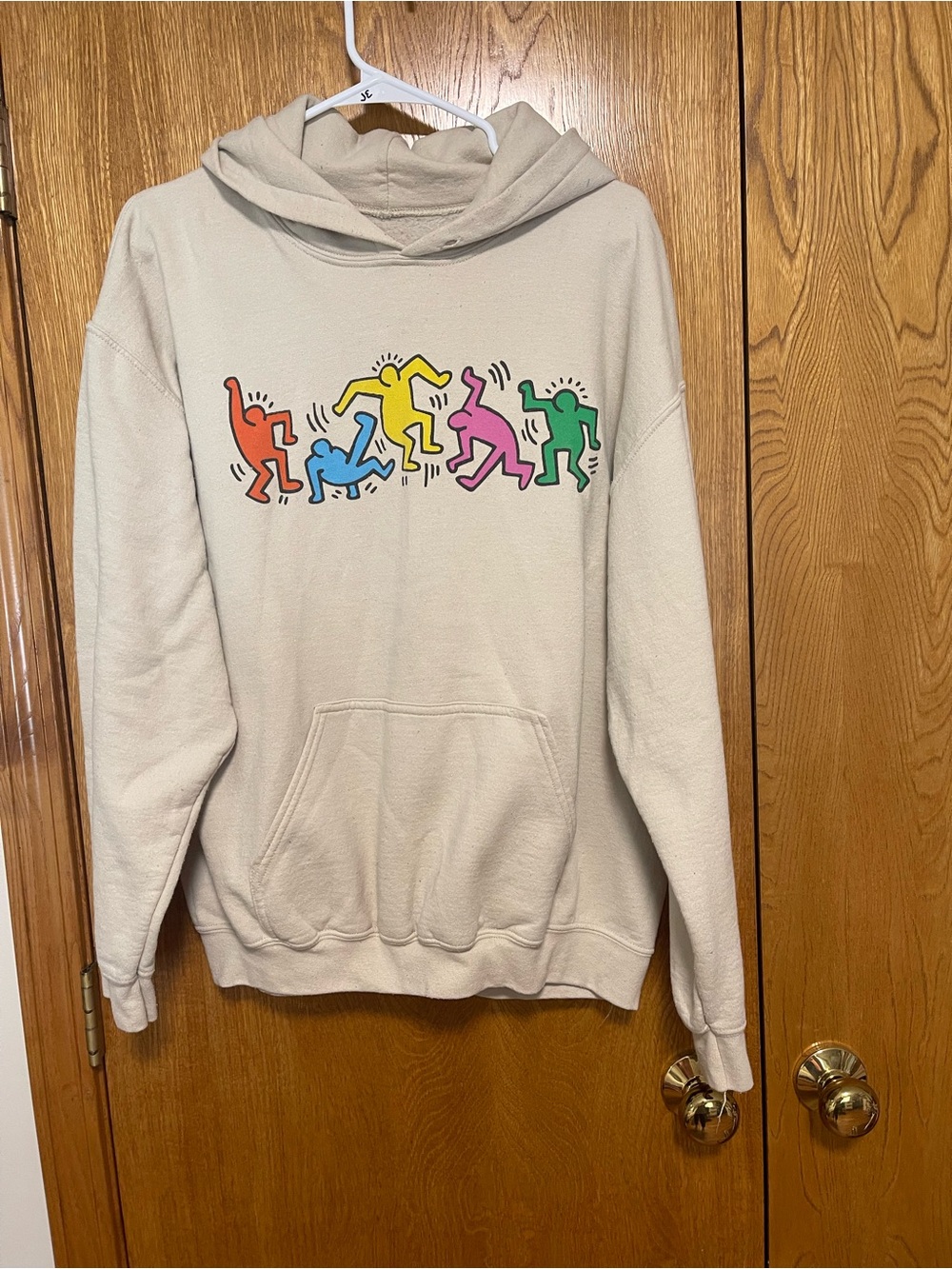 Cream Hooded Sweater with Colorful Dancing Figures - Keith Haring